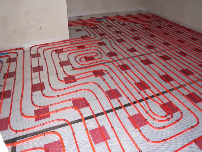 Underfloor heating pipes laid before screed in a Stockport property